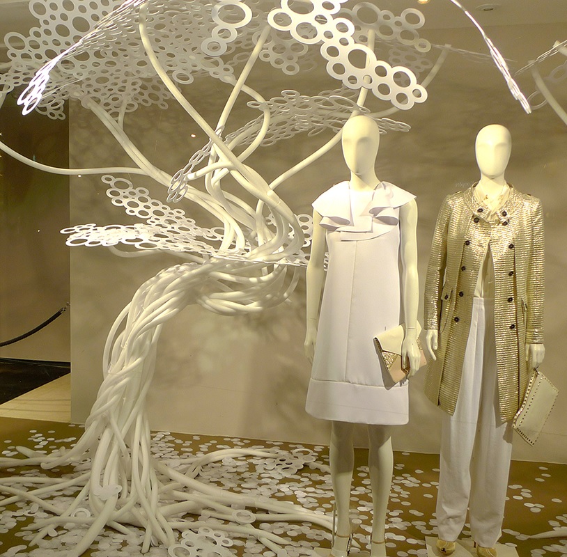 Pictures of creative white windows and Visual Merchandising at the